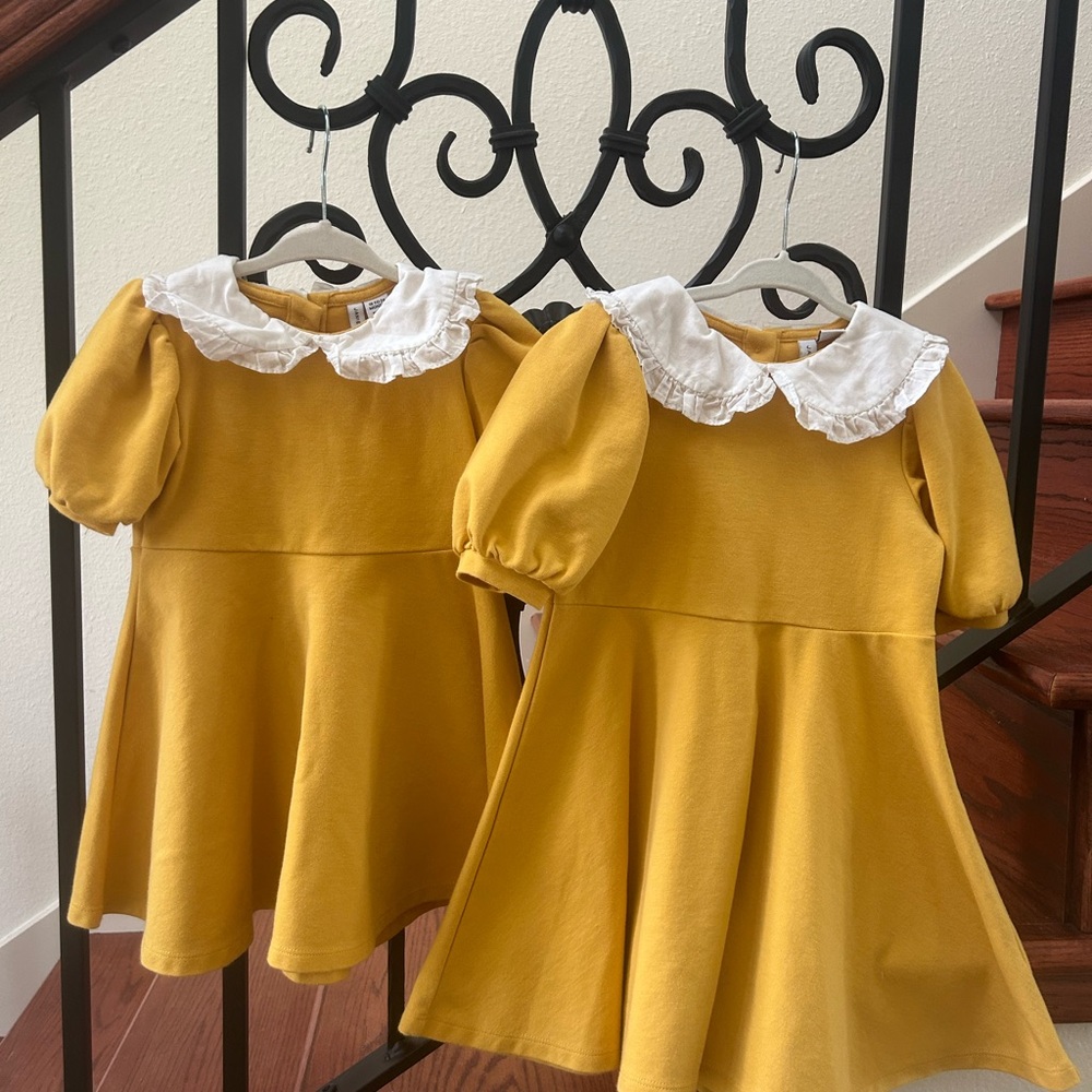 Mustard yellow dresses.